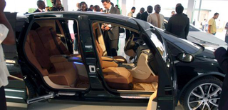 Illustration for article titled Moammar Gadhafi's Custom-Built Not-So-Rocket Car